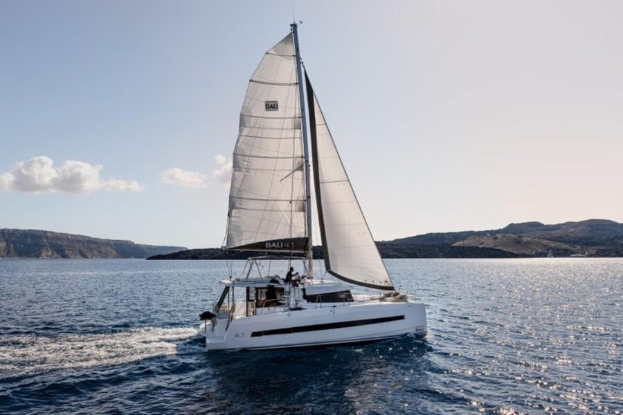 Santorini Catamaran Sunset Skyline Cruise - Akrotiri Lighthouse and entering the Caldera for panoramic views