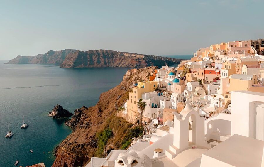 Santorini Catamaran Sunset Skyline Cruise - Volcano crater photo stop and the real reason hot springs are the star