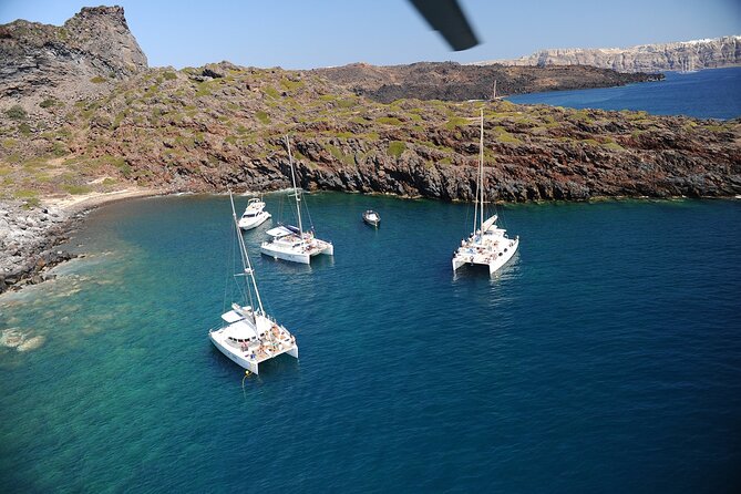 Santorini Classic Catamaran Cruise with BBQ, Drinks and Transfers - Transfers back to your hotel, and the cruise ship reality check