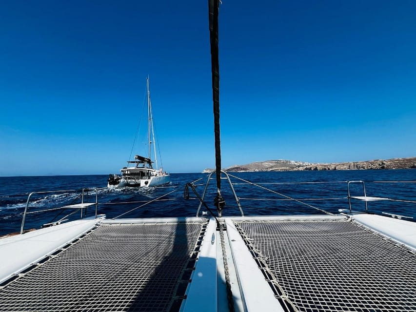 Santorini:Cruises with Catamaran around the Volcanic Island. - White Beach by Boat, Plus the Lighthouse and Black Mountain