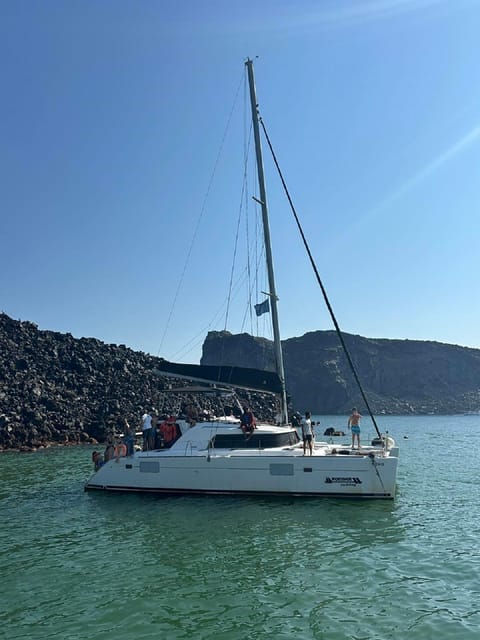 Santorini:Cruises with Catamaran around the Volcanic Island. - What You Get On Board: Crew, Boats, and Comfort Details