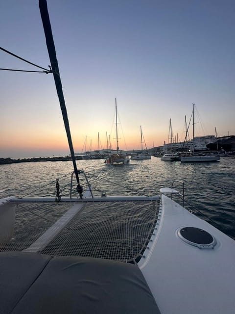 Santorini:Cruises with Catamaran around the Volcanic Island. - Price and Value at About $106 Per Person