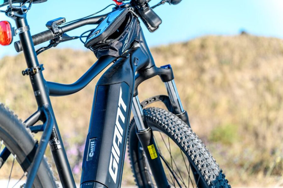 Santorini e-bike guided tours - Perissa to Emporio, coastal riding with picture stops that feel earned