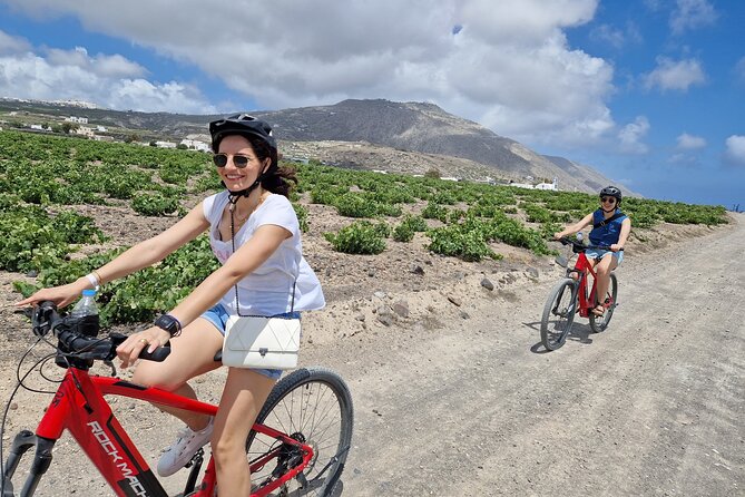 Santorini: E-Bike Sunset Tour Experience - Tomato, coffee, water, and the included snack moment