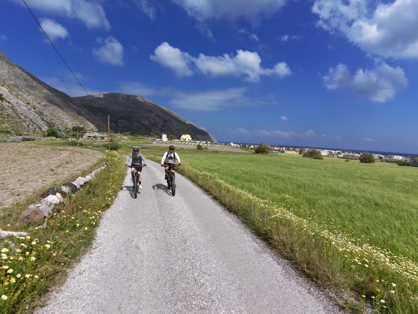 Santorini: Electric Mountain Bike Adventure - Vlichada Port passing and a private beach reset