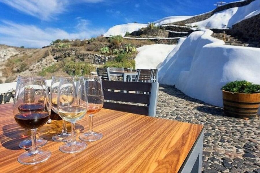 Santorini: Fira Town Walking Tour with Wine Tasting - What to Bring for Comfortable Walking on Cobblestones