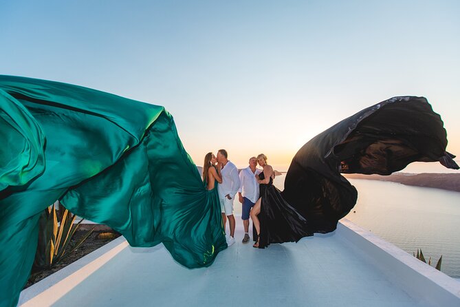 Santorini flying dress photo - Oia vs Imerovigli: where you’ll get the money shots