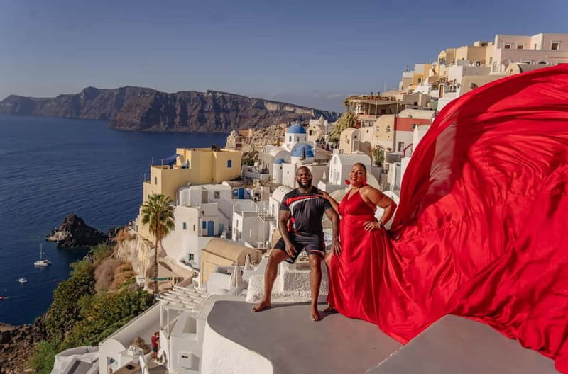 Santorini: Flying Dress Photoshoot Private Entry to Blue Dom - Choosing Oia, Imerovigli, Fira, or your hotel
