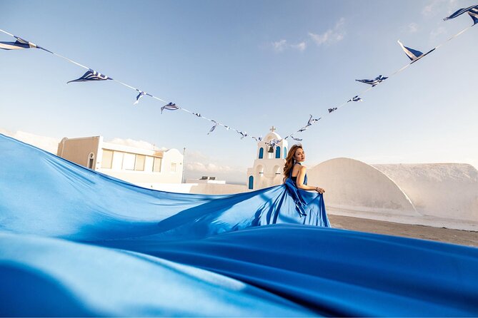 Santorini: Flying Dress Professional Photography <em>Dress Included</em> – Key things to know before you go’ /><br />
• <strong>Dress included</strong>: one flying dress for solo and couple options, and one dress per lady for the Best Friends option</p>
<p><p>• <strong>Oia focus or multi-village route</strong>: 1-hour shoot centers on Oia, while the 3-hour option can cover up to 3 villages</p>
</p>
<p><p>• <strong>You’ll get guidance, not guesswork</strong>: pose and angle coaching is part of the package</p>
</p>
<p><p>• <strong>Edited photos arrive fast</strong>: plan on <strong>7 to 10 days</strong> for delivery</p>
</p>
<p><p>• <strong>3-hour option includes pickup</strong>: transportation pick up and drop off is included for the longer version</p>
</p>
<p><p>• <strong>Comfort matters</strong>: expect real walking, and shoes can get distracting when you’re trying to stay in the shot</p>
</p>
<h2>Why a flying dress fits Santorini so well</h2>
<p>Dress Included</em> – Why a flying dress fits Santorini so well’ /><br />
Santorini’s look is all about contrast, bright white buildings against deep blue sky and the dramatic cliff edges. A flying dress leans into that, because it adds a wind-driven, flowing element that looks great with movement and changing angles.</p>
<p><p>In practical terms, this setup helps your photos avoid that stiff, standing-still vibe. With a dress designed to billow and photographers guiding your stance, you end up with images that feel dynamic even if you are only at one spot for a short time.</p>
</p>
<p><p>I also like the way this approach works for different trip styles. If you are on your honeymoon or celebrating a milestone, it feels special. If you just want an upgraded souvenir, it still feels fun and worth the time.</p>
</p>
<div class="twil" style="margin: 20px 0; padding: 15px 0;"><p>Long dress, big view, more shoots</p><ul style="margin: 10px 0; padding-left: 0; list-style: none;"><li style="margin: 6px 0; line-height: 1.4;"><a href="https://santoriniexplorer.com/santorini-2h-private-flying-dress-photoshoot-with-transportation/">Santorini 2h Private Flying Dress Photoshoot with Transportation</a><span style="margin-left: 8px; font-size: 0.82em; color: #555; white-space: nowrap;"><span style="color: #E0A02E;">★</span> 5.0 &middot; 357 reviews</span></li><li style="margin: 6px 0; line-height: 1.4;"><a href="https://santoriniexplorer.com/exclusive-santorini-flying-dress-photoshoot-with-pickup/">Exclusive Santorini Flying Dress Photoshoot with Pickup</a><span style="margin-left: 8px; font-size: 0.82em; color: #555; white-space: nowrap;"><span style="color: #E0A02E;">★</span> 4.5 &middot; 336 reviews</span></li><li style="margin: 6px 0; line-height: 1.4;"><a href="https://santoriniexplorer.com/flying-dress-photoshoot-in-santorini-by-flying-dress-photo/">Flying Dress Photoshoot in Santorini by Flying Dress Photo ©</a><span style="margin-left: 8px; font-size: 0.82em; color: #555; white-space: nowrap;"><span style="color: #E0A02E;">★</span> 5.0 &middot; 137 reviews</span></li></ul></div><h2>What you actually get: pro photos, phone videos, and editing</h2>
<p><img width="669" height="446" decoding="async" src=
