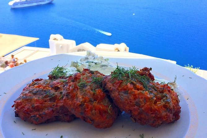 Santorini Food Tour: Fira Half-Day Small-Group Tour with Tastings - The midday tavern meal, caldera views and a real sit-down