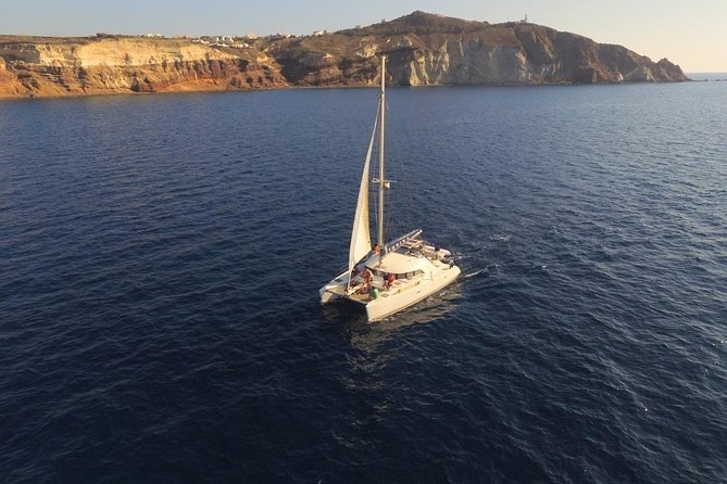 Santorini Full Day Catamaran Private Cruise incl. Meal, Drinks & Free Transport - Vlihada Port: The Starting Point South of the Rush