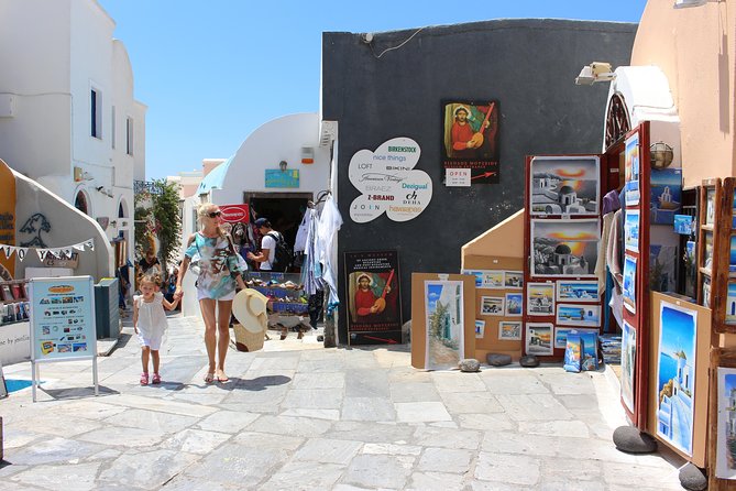Santorini Full Day Tour - Palea Kameni hot springs: green water, foot-soaking options