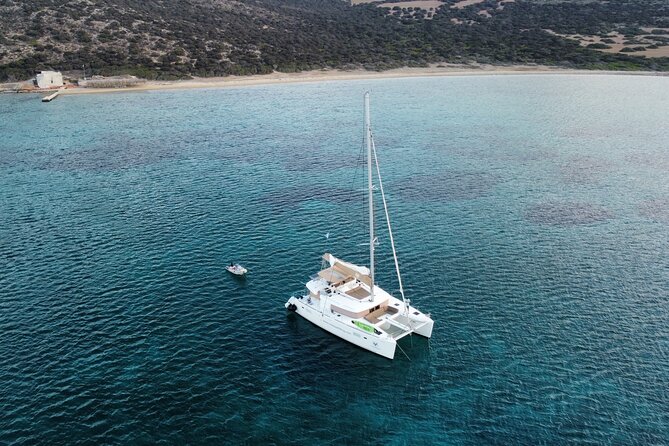 Santorini Gold Catamaran Cruise with BBQ, Drinks and Hotel Pickup - The route: Red Beach, White Beach, and the Akrotiri lighthouse