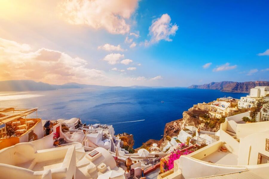 Santorini: Guided Island Day Trip with Beach Visit - Fira on the caldera edge: where you trade history for street scenes