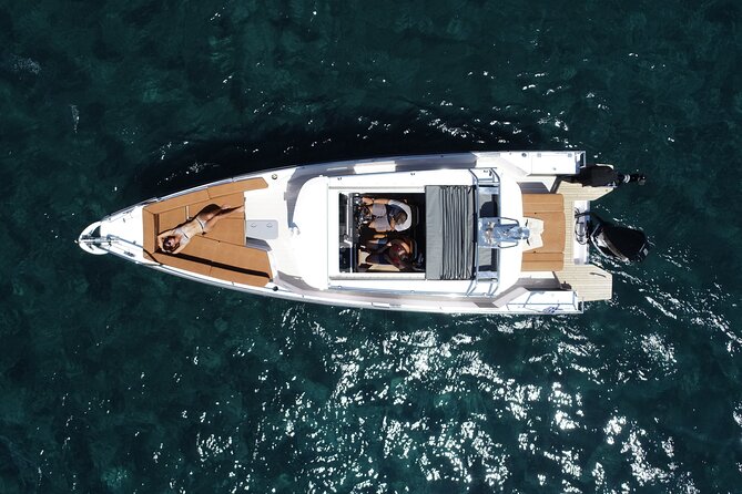 Santorini Half Day MotorCruiser Private Cruise incl. Meal,Drinks &Free Transport - Faros lighthouse: small stop, big “I get it” moment