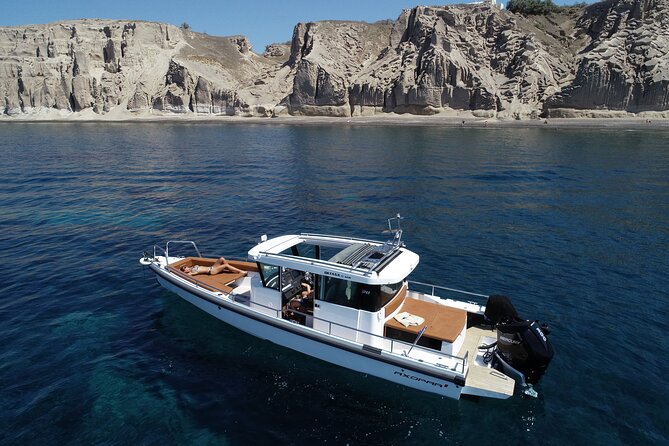 Santorini Half Day MotorCruiser Private Cruise incl. Meal,Drinks &Free Transport - Aspronisi (Strogili): a tiny uninhabited island with big geology