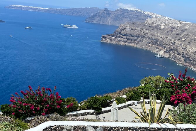 Santorini Highlights: Private Sightseeing Tour in Santorini - Megalochori: traditional village walls, restored homes, and pirate-style legends