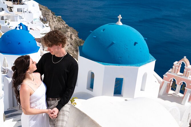 Santorini Highlights Private Tour 6 hours, pick up/ drop included - Stop 1: Three Bells of Fira and the blue-dome photo hit