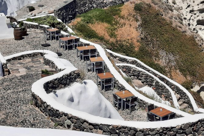Santorini like a local: Discover local flavors by exploring the island! - Perissa Black Sand Beach: swim, then eat like you mean it