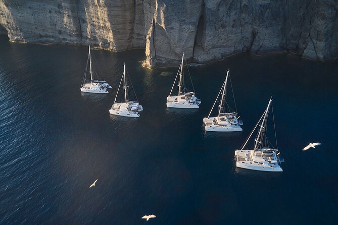 Santorini: Luxury Catamaran Cruise with Fresh Fish BBQ & Drinks - Timing math: why the short stops work, and the one thing to avoid