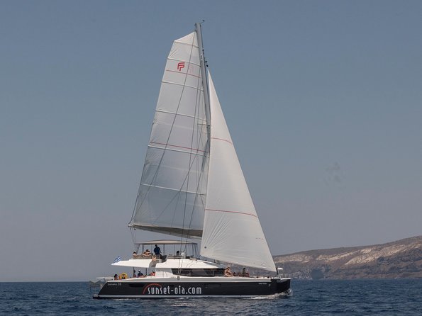 Santorini Luxury Catamaran Day Cruise with BBQ,drinks,transfer - What feels “luxury” here: drinks, BBQ, and comfort that you actually use