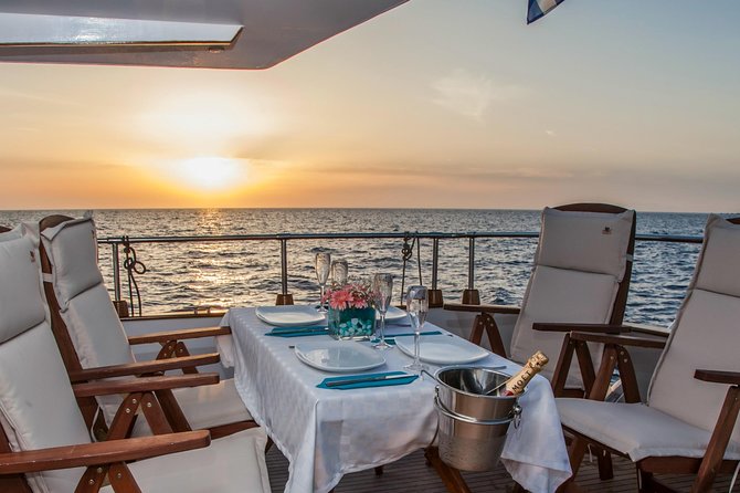 Santorini: Motor Yacht Sunset Cruise with 5-Course Dinner - The 5-course dinner onboard: what you get and how to judge the quality
