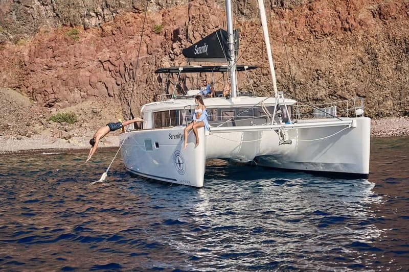 Santorini Oia: Caldera Day Cruise with Snacks & Drinks - Snacks, Fruit Salad, and Unlimited Dry White Wine: What You Get and How to Use It