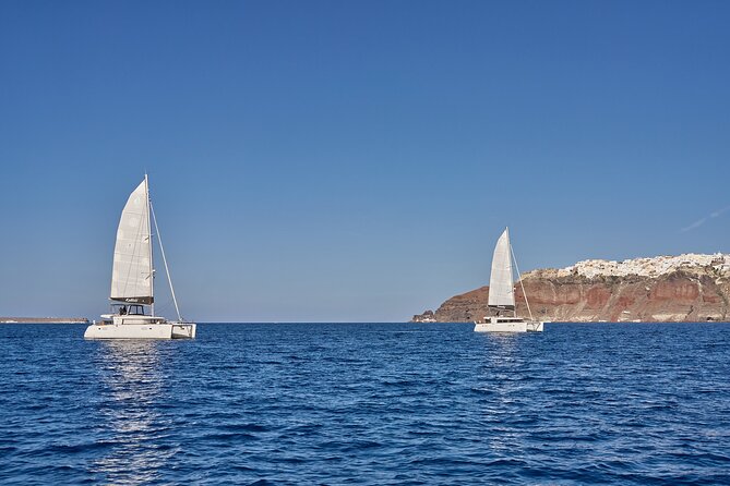 Santorini Oia: Caldera Luxury Day Cruise with BBQ & Drinks - Photos from the sea, plus time near Santorini’s oldest port feel