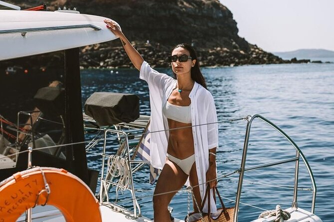 Santorini Oia: Private Sunset Catamaran Cruise with BBQ & Drinks - Stop 2, Palea Kameni: volcano rocks and sulfur springs water