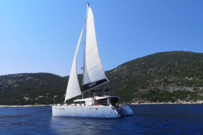 Santorini Oia: Private Sunset Catamaran Cruise with BBQ & Drinks - Stop 3, Nea Kameni: floaty volcanic water and a quick island taste