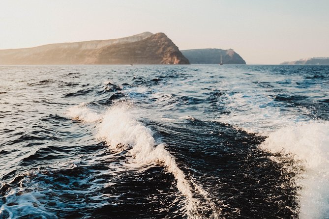 Santorini Private Catamaran Cruise with BBQ, Open Bar & Transfers - Volcanic explanation, plus sailing past Thirasia’s quieter side