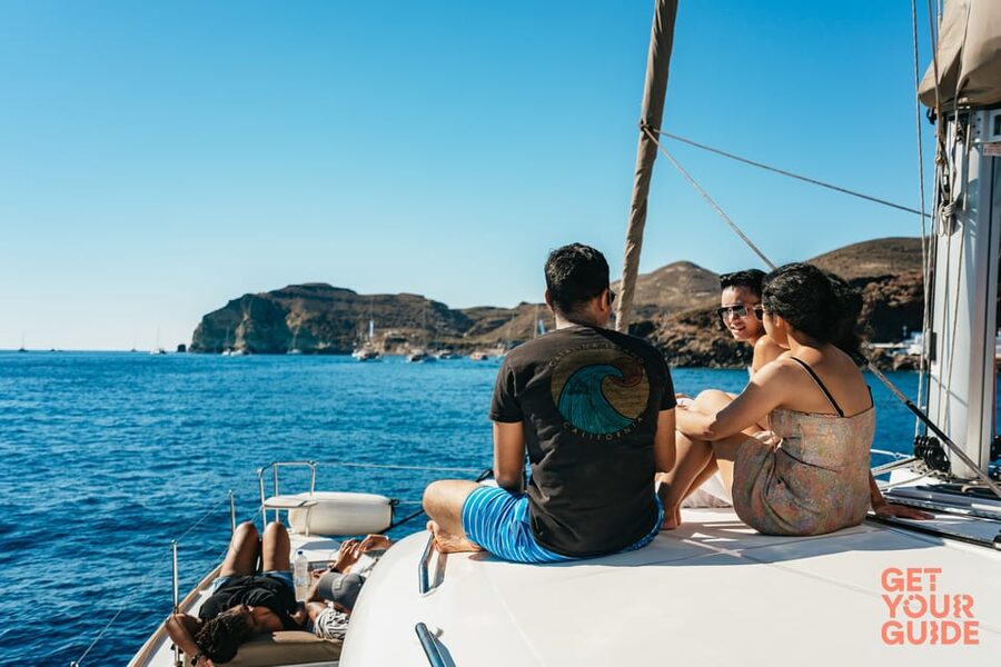 Santorini: Private Catamaran Tour with BBQ Meal and Drinks - Red Beach Stops: Fast Photos, Big Color, Real Geology