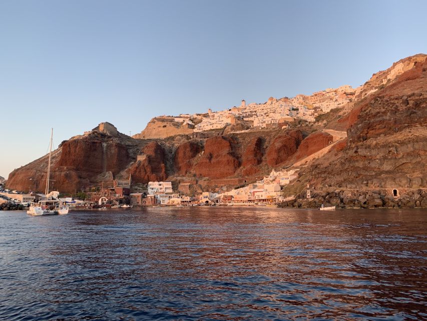 Santorini Private Cruise boat fishing tour - BBQ, Snorkeling - How the sunset angle from the fishing boat changes everything