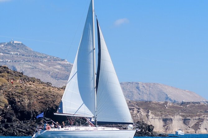 Santorini Private Daytime Sailing Cruise with Meal, Drinks &Transfer included - The return route: Thirasia’s rocks, Aspronisi, then back to Vlychada