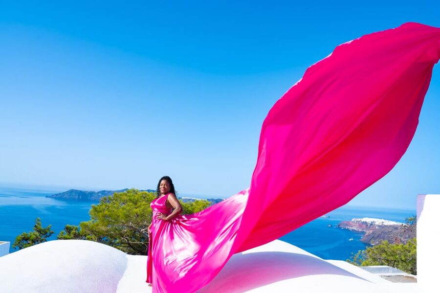 Santorini: Private Flying Dress Photoshoot with Pickup - Pickup in Thera and a smooth 2-hour rhythm