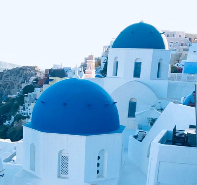 Santorini: Private Photography Tour - Oia cliffside time: blue domes, cave houses, and real photo pacing