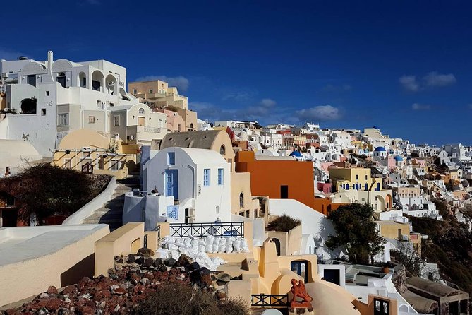 Santorini Private Romantic Tour with Dinner & Wine Tasting - Pickup timing, private vehicle comfort, and how to plan your day