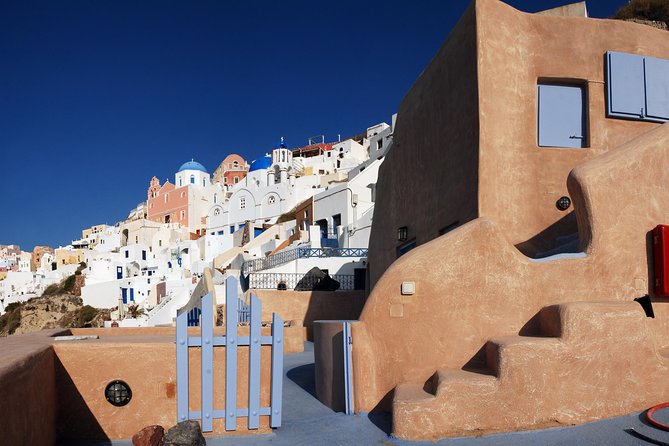Santorini Private Scenic Shore Excursion: Oia, Mt Profitis and Ilias Monastery - Fira and the cable car: the cliff-to-town payoff at the end of the day