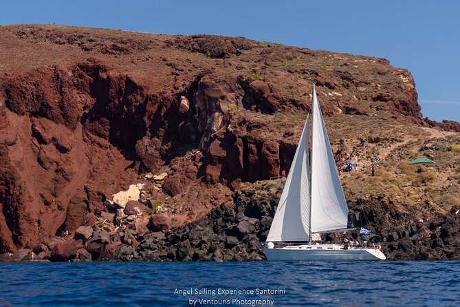 Santorini Private Sunset Sailing Tour with Dinner, Drinks &Transfer included - Thirassia Island Swim Stop and the Dinner Timing