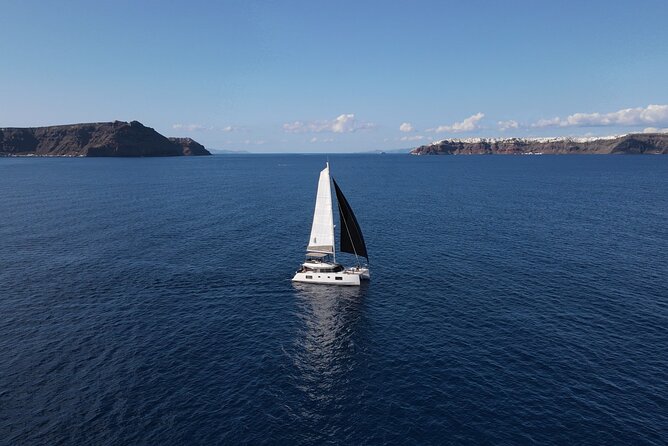Santorini Private Tour Half-Day Sailing Platinum Catamaran Cruise - Getting to the boat: Vlichada meeting point and pickup reality