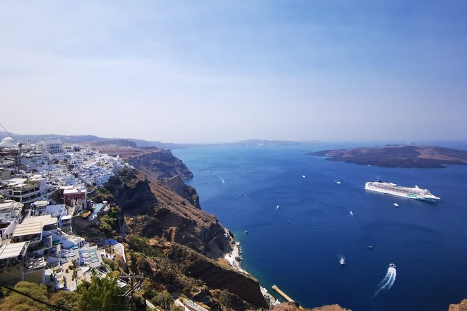 Santorini Private Tour Highlights 6h for Groups and Families - Stop 1: Firostefani Blue Dome views, volcano energy, and cruise-ship spotting