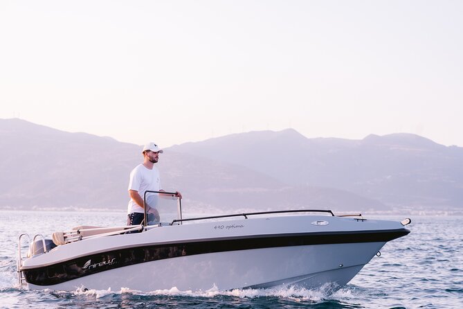 Santorini Rent a Boat - License free private cruise - Snorkel and swim stops: choosing quiet over a crowd