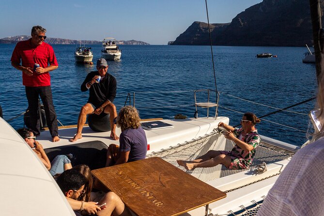 Santorini Sailing Catamaran Daily Cruises w/ Greek BBQ @Thirasia - The Venetian lighthouse of Akrotiri: quick pass-by, strong payoff