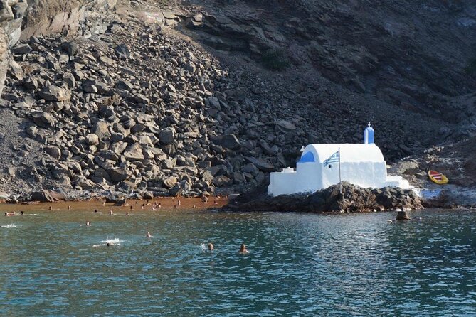 Santorini Sailing Catamaran Daily Cruises w/ Greek BBQ @Thirasia - Sailing back to Vlychada, with champagne to close out the day