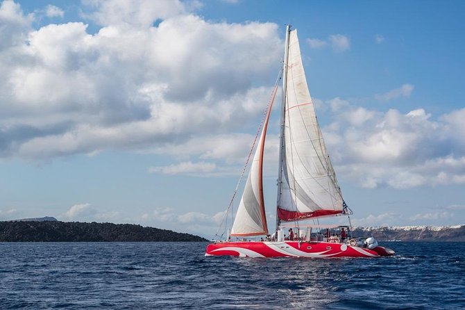 Santorini Sailing Dream Catcher with BBQ Lunch and Drinks - Crew and onboard atmosphere: why names like Panos and Dimitris show up