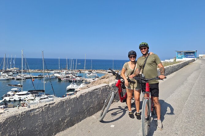 Santorini Small Group Guided E-bike Tour & Local Tomato Museum - Vineyard lessons with basket-trained grapevines