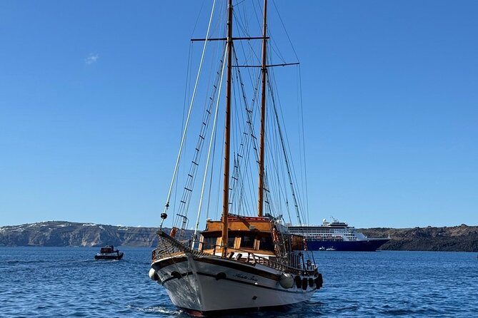 Santorini Sunset Cruise in Caldera - The sunset sail around the caldera: photos, wine, and the Oia-style views