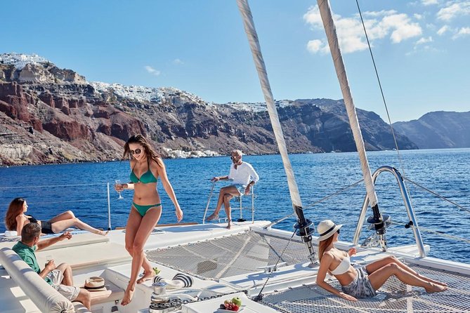 Santorini Sunset Luxury Sailing Catamaran Cruise with BBQ, drinks, transfer - Pickup, Port, and Boarding Rules That Save You Stress