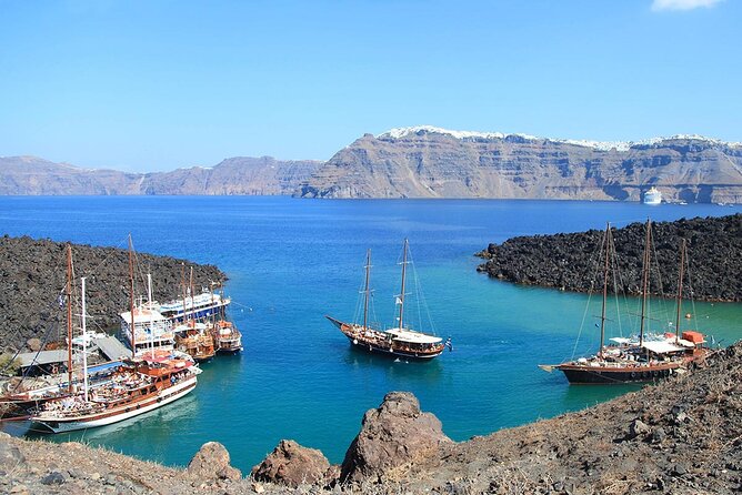 Santorini Sunset Sailing Cruise: Dinner, BBQ, Open Bar, Transfers - Volcano hot springs in the caldera: sulfur-rich water, one calm hour