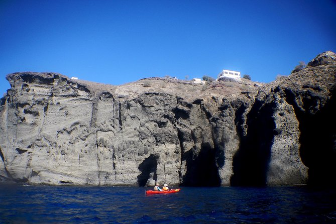 Santorini: Sunset Sea Kayak with Light Dinner with Pick-up Option - Snorkeling and beach picnic: what to expect during the swim break